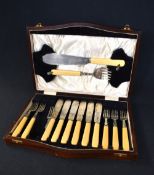 A 20th century canteen of silver flatware and cutlery, containing a six piece silver setting of