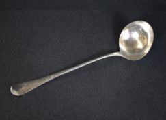 An early George III silver Hanoverian pattern soup ladle, of traditional form having 'WAW'