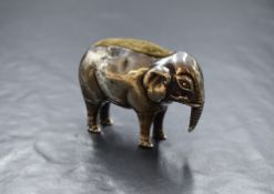 An Edwardian silver novelty pin cushion, modelled as an elephant having dark fabric to the body,