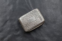 A George III silver vinaigrette, of hinged rectangular form, having decorative engraving to the