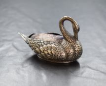 An Edwardian silver novelty pin cushion, modelled as a swan having dark fabric to the back, marks