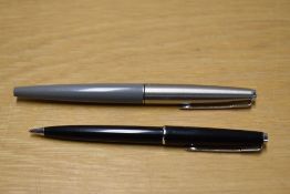 A Parker 45 fibre tip pen in grey and Esso advertising propelling pencil in black