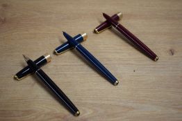 Three Parker 17 Super Duofold aerometric fill fountain pen in blue, black and red with gold trim