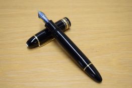 A Montblanc Meisterstuck 149 piston fill fountain pen (KB107600) in black with a braod and two