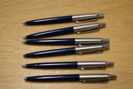 Six Parker Jotter ballpoint pens in blue