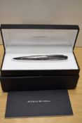 A boxed Alfred Dunhill AD2000 ballpiont pen in silver plate having fluted design, with care booklet