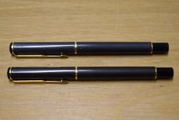 A Parker Rialto converter fill fountain pen and a Rollerball pen in Laque Metallic Grey