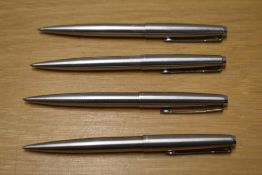 Four Parker 45 Flighter ballpoint pens