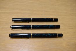 Two Parker Rialto converter fill fountain pens and a rollerball pen in Laque Aqua
