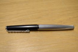 A Montblanc Carrera roller ball pen in Matte Black and brushed steel. As Found cap will not clip