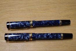 Two Parker Duofold rollerball pens in blue. No cartridge