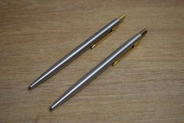 Two Parker 75 ballpoint pens in Flighter having gold trim