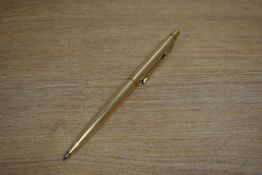 A Parker 75 ballpoint pen in rolled gold having decorative band
