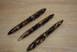 A Sheaffer Balance II cartridge/converter fountain pen, Ballpoint pen and Rollerball pen in Amber