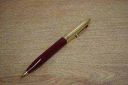 A Sheaffer Crest Ballpoint pen in Red with Gold plated cap