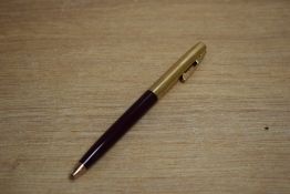 A Sheaffer Imperial ballpoint pen in Burgundy with gold cap