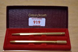 A boxed Conway Stewart small gold ballpoint pen and pencil set