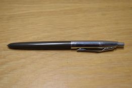 A Conway Stewart ballpoint pen in Khaki with chrome cap