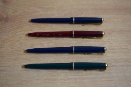 Four Parker 17 Jotter ballpoint pens in black, red, green and blue. One with chalk mark