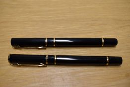 A Waterman Laureat cartridge converter fill fountain pen and rollerball pen in Black the fountain