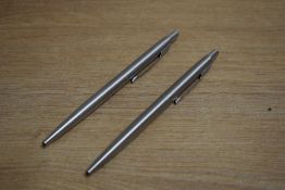 Two Parker 75 ballpoint pens in Flighter having chrome trim (one advertising)