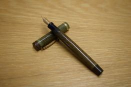 A Parker Duofold Junior Streamlined Lucky Curve made in Canada in green having Parker fountain pen