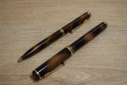 A Sheaffer Ballpoint pen and Rollerball pen in Tortoishell Laque