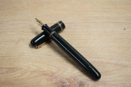 A Mabie Todd & Co Swan 3240 Self Filler lever fill fountain pen in green with two narrow cap bands