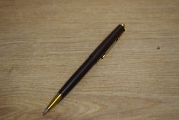 A Parker 50 ballpoint pen in Matte Brown with gold trim