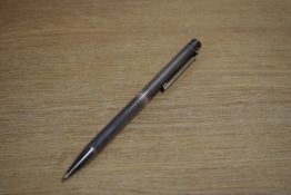 A Sheaffer Targa 1004x Sterling Silver straight line pattern with gold plated trim ballpoint pen