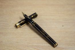 A Sheaffer Targa 1044 converter fill fountain pen in Laque Golden Filigree having Sheaffer USA 585