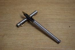 A Sheaffer Targa 1001s Brushed Steel converter fill fountain pen