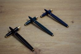 Three Parker 17 Super Duofold aerometric fill fountain pen in blue, black and green with gold trim