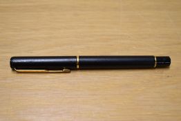 A Parker 88 Rialto roller ball pen in laque black. Slightly chewed