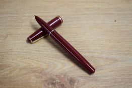 A Parker 17 Lady aerometric fill fountain pen in red with gold trim