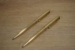 Two Parker 75 ballpoint pens in rolled gold reeded design
