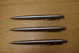 Three Parker Jotter ballpoint pens in Flighter brushed steel