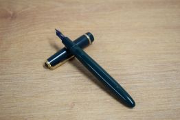 A Parker Duofold aerometric fill fountain pen in green with Duofold cap band having Parker 14k