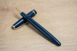A Parker Duofold aerometric fill fountain pen in green with Duofold cap band having Parker 14k