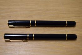 Two Waterman Laureat cartridge fill fountain pens in Black Laque having Waterman France one F one M