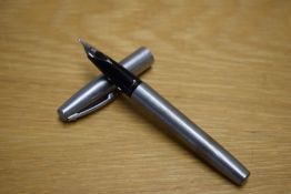A Sheaffer Imperial 444 converter fill fountain pen in brushed stel having Sheaffer nib