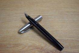 A Sheaffer Imperial cartridge / converter fill fountain pen in Black with brushed steel cap