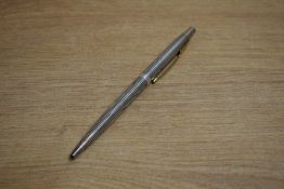 A Parker 75 ballpoint in Sterling Silver Cecile with gold trim