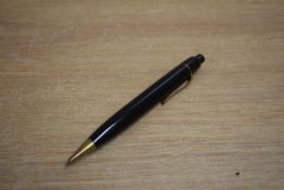 A Montblanc Pix propelling pencil in black with gold trim