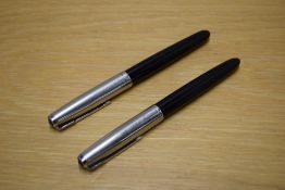 Two Parker 51 aerometric fill fountain pens in Black with lustraloy caps