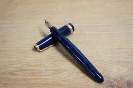 A Parker Duofold aerometric fill fountain pen in dark blue with Duofold broad cap band having Parker