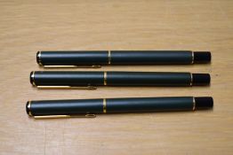 Two Parker Rialto converter fill fountain pens and a rollerball pen in Matte Dark Green