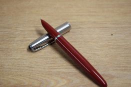 A Parker 41 aerometric fill fountain pen in red with lustraloy cap.