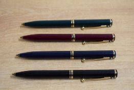 Four Sheaffer Connaiseur ballpoint pens, in Black, Dark Blue Green and Burgundy laque