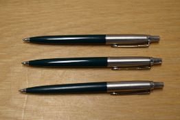Three Parker Jotter ballpoint pens in dark green